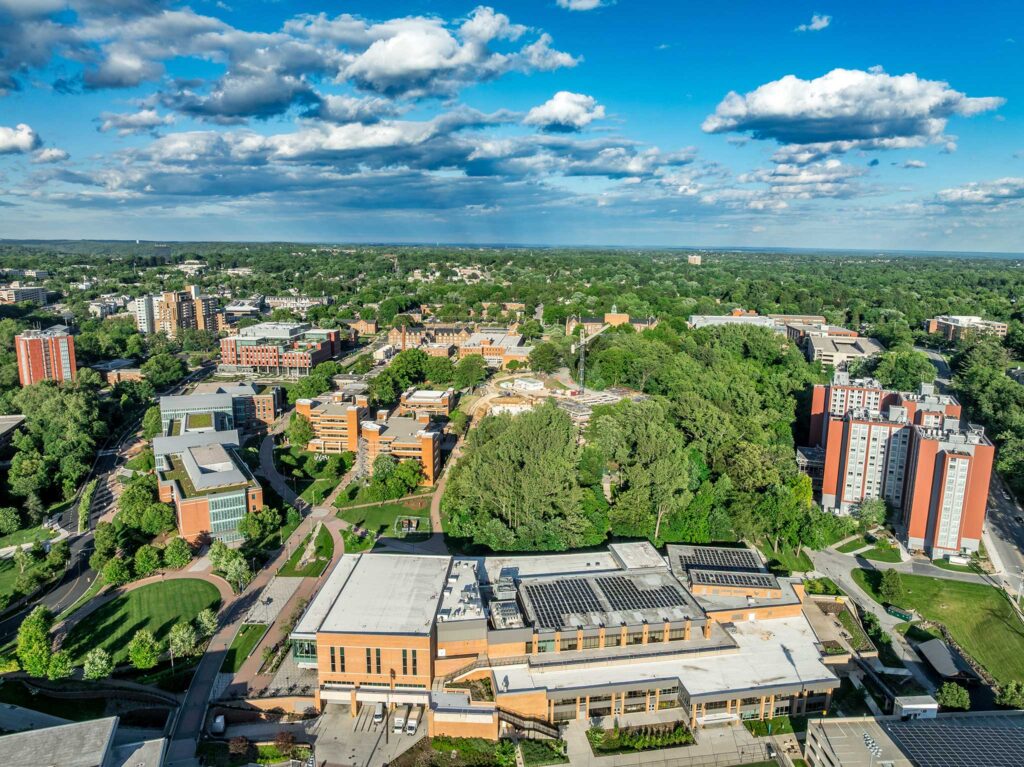 Aerial view of a university campus and surrounding community